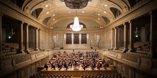 Orchestra practicing in an opera house