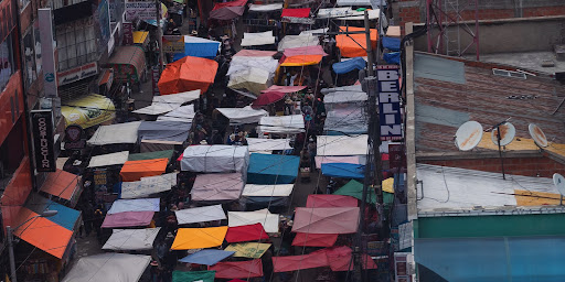 english others trade experience market vendors earings exception funds service economy informal economy globalization market data menu items main street street market street market street market street market local community sign store 