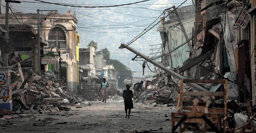 earthquake economic vulnerability cyclone flooding infrastructure port-au-prince economic loss nation